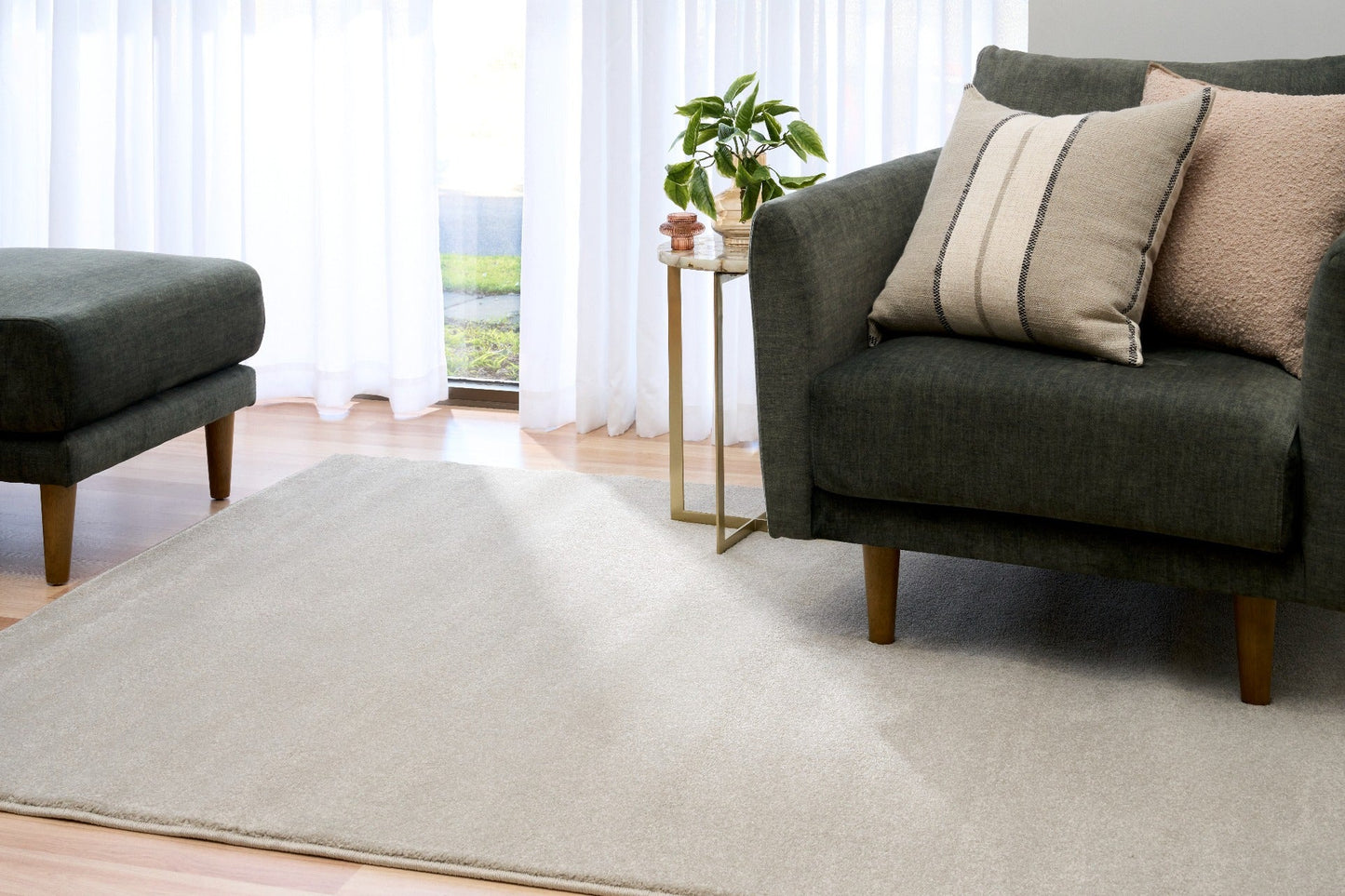 Light gray area rug on the floor in a living room setting. | Eclipse Presidente Modern Polypropylene Area Rug - Rugs Point Australia