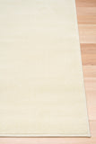 Cream area rug with thin border, corner view on hardwood floor | Eclipse Shanghai White Modern Abstract Floor Rug - Rugs Point Australia