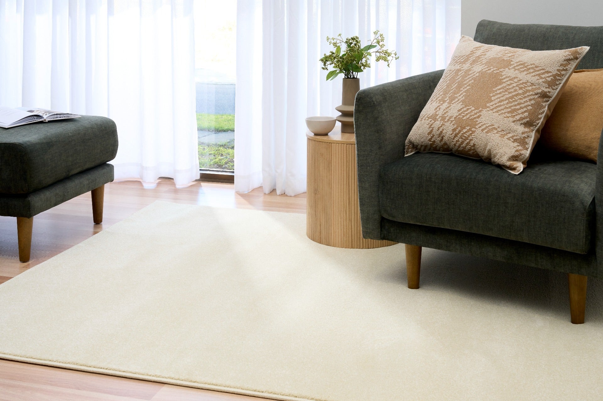 Cream area rug with subtle border, laid flat in a living room setting | Eclipse Shanghai White Modern Abstract Floor Rug - Rugs Point Australia