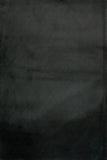 Charcoal rug surface with subtle diamond grid texture