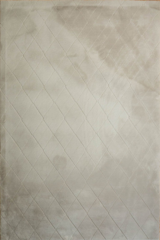 Silver shag rug showing diamond lattice weave and even short shag pile