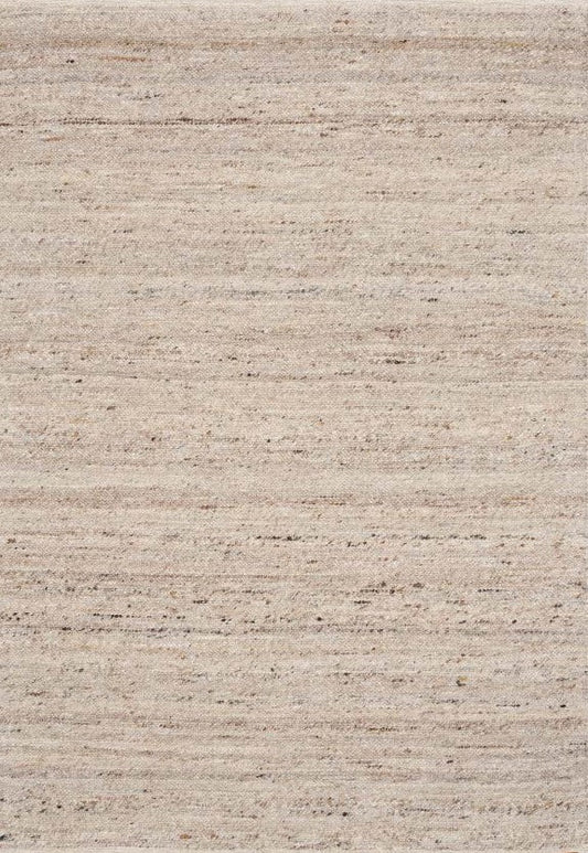 Beige wool rug with subtle speckled texture, close-up of woven fibers