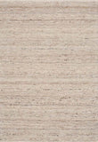 Beige wool rug with subtle speckled texture, close-up of woven fibers