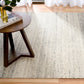 Grey wool area rug full view with speckled texture and thin horizontal striping