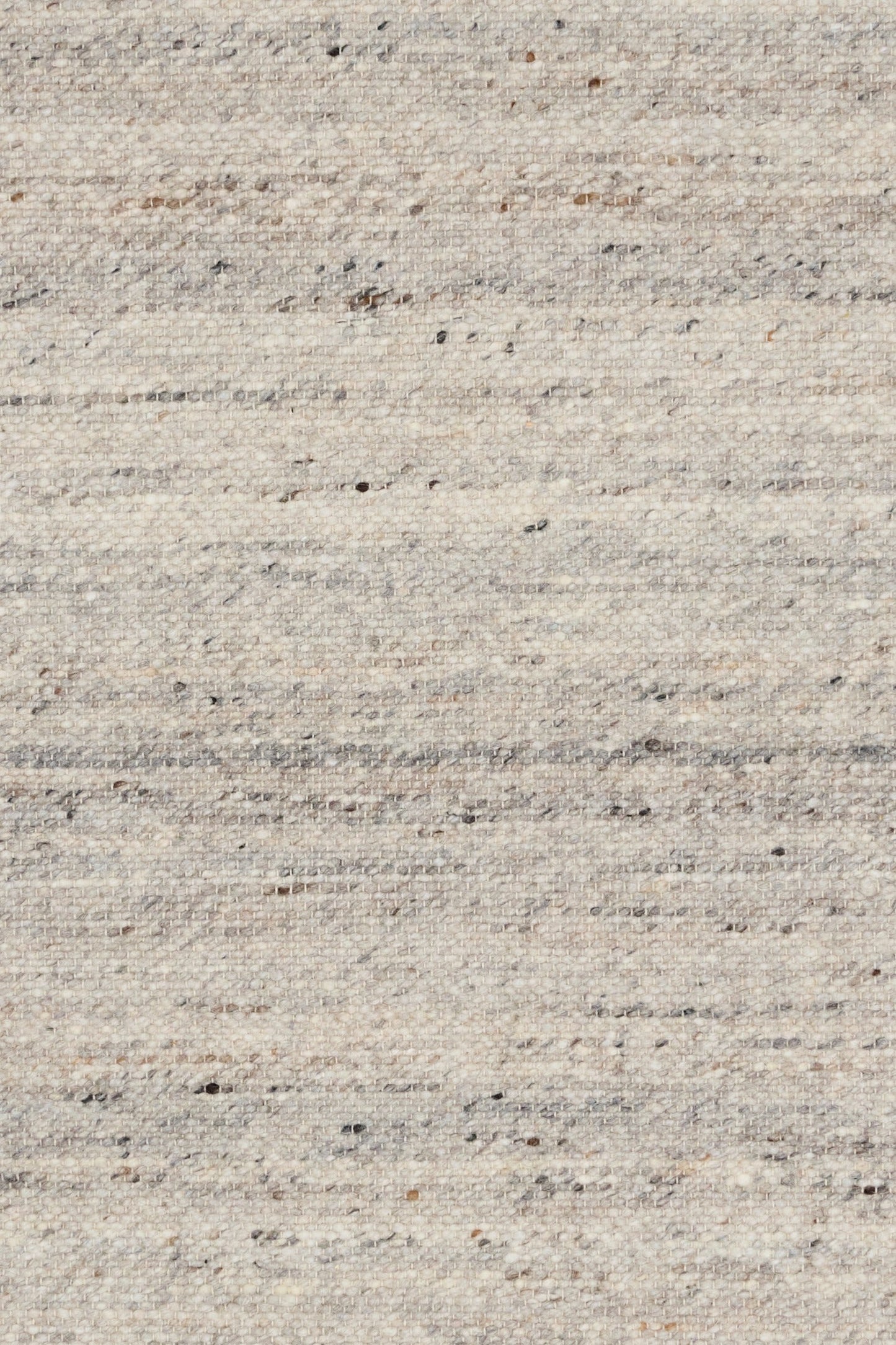 Smoke grey wool rug close-up of speckled woven fibers and horizontal lines