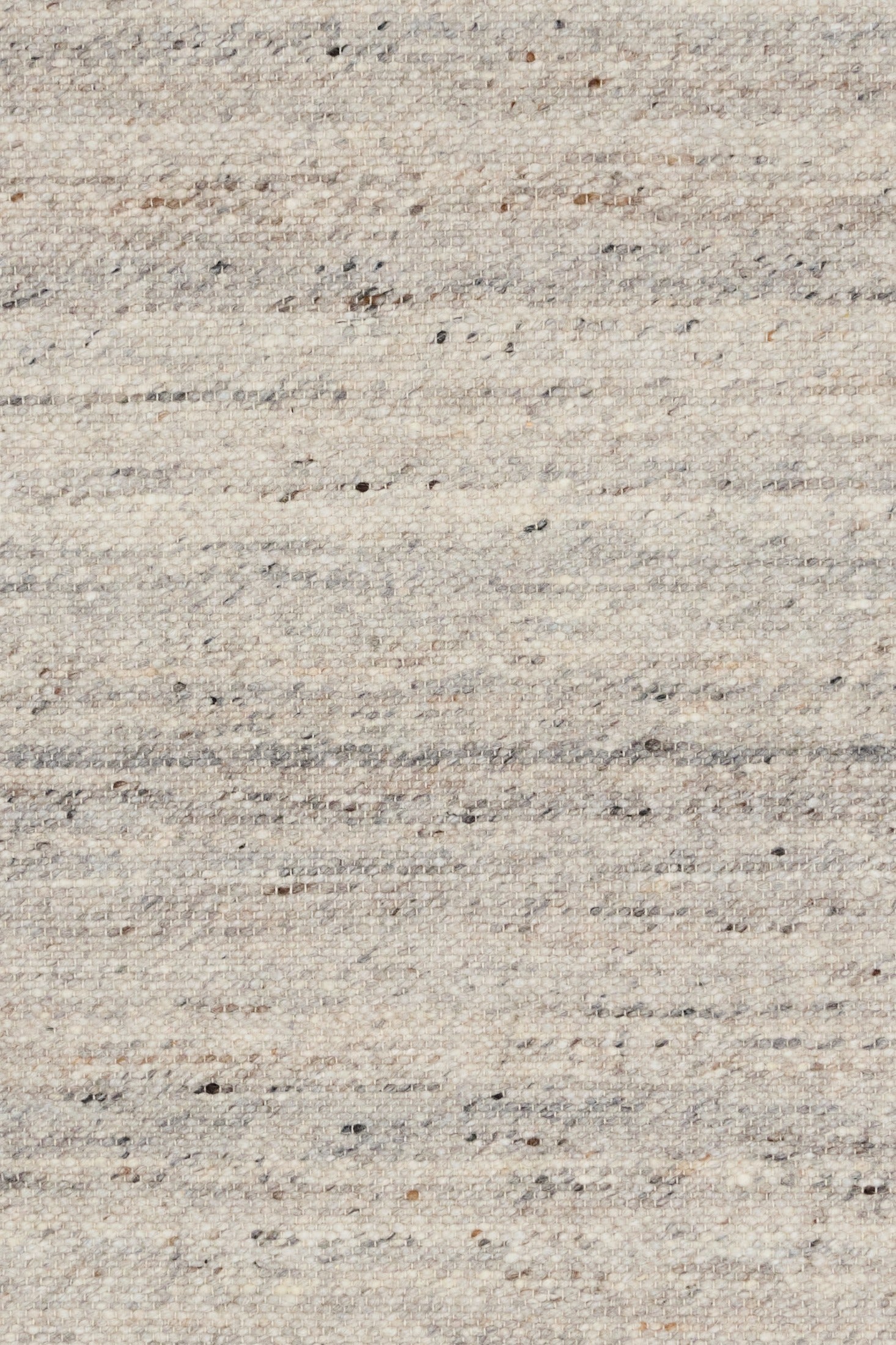 Smoke grey wool rug close-up of speckled woven fibers and horizontal lines