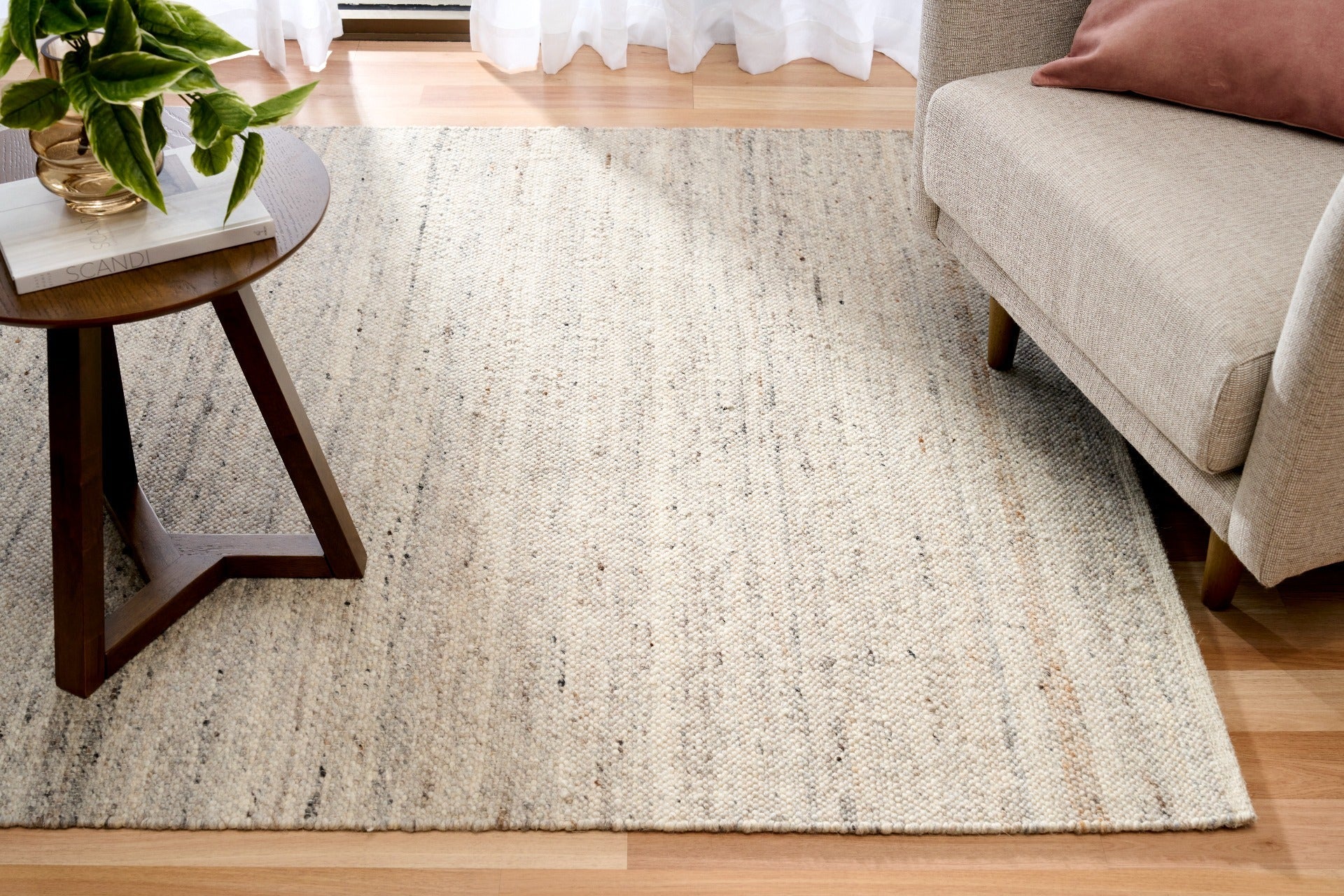 Smoke grey wool rug with speckled low-pile woven texture, rectangular