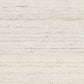 Close-up of white wool rug surface with speckled, woven horizontal pattern