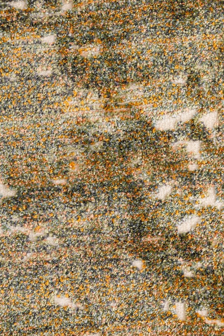 Close-up of beige multipurpose rug with multicolor speckled distressed weave