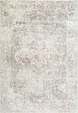 Taupe distressed area rug with faded geometric medallion pattern