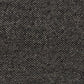 Charcoal textured woven rug surface detail