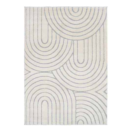 Ivory and light gray shagg rug with repeating arched line pattern, full front view