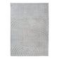Light grey shag rug with raised circular and wave pattern, close-up