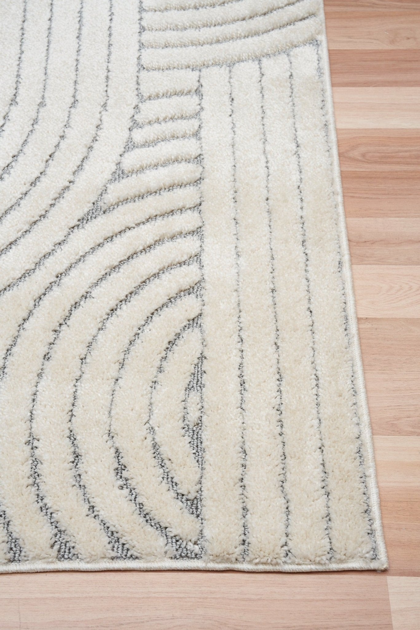 Marli Soft living room rug close-up: ivory pile with light grey curved line pattern | Marli Soft Living room rug 12417 Ivory Light Grey Modern Abstract Living Room Rug - Rugs Point Australia