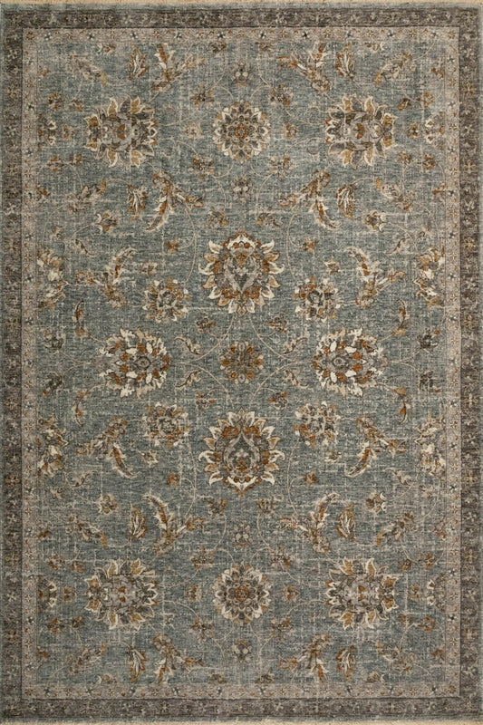 Blue-gray ornamental area rug with centered medallion and symmetrical floral border