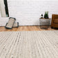 Ivory chunky knit wool floor rug spread flat on the floor