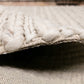Ivory chunky knit wool rug edge with folded border and thickness