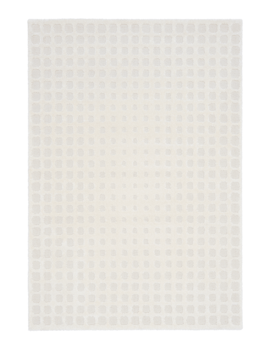Cream area rug featuring raised square dot texture across the surface
