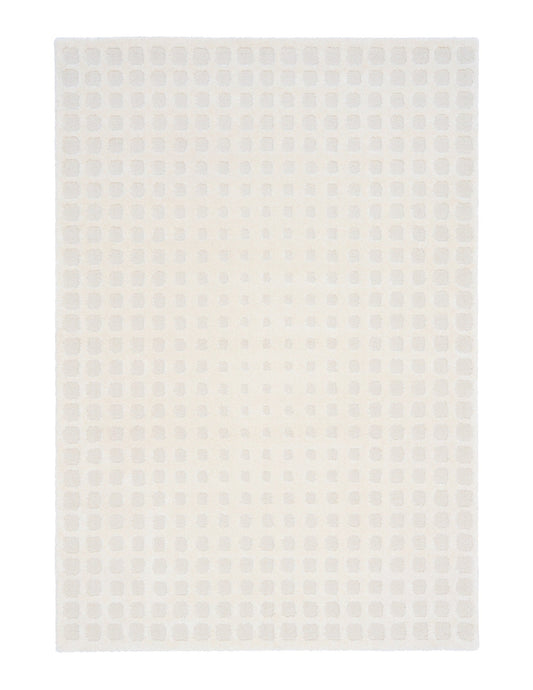 Cream textured area rug with raised square dot pattern