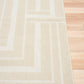 Ozlo ecru patterned area rug flatweave with border on side