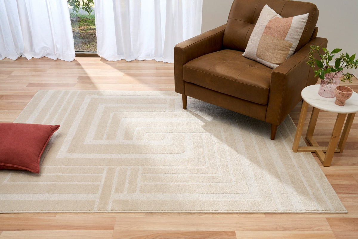 Ozlo ecru patterned area rug with geometric design