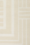 Ozlo ecru patterned area rug corner with Greek key border