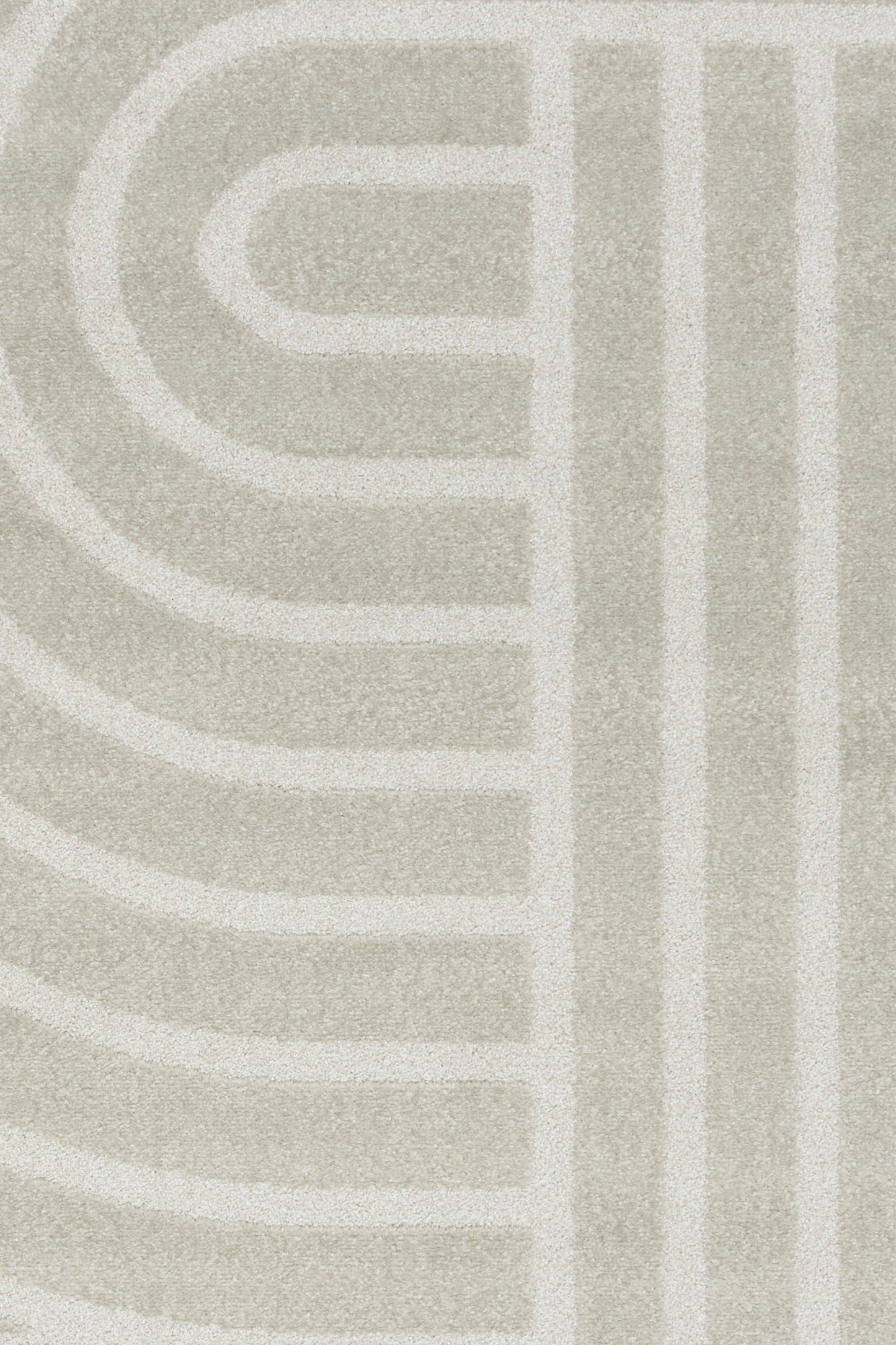 Light gray area rug with abstract arch and bar stripe pattern, close-up
