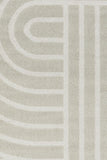Light gray area rug with abstract arch and bar stripe pattern, close-up