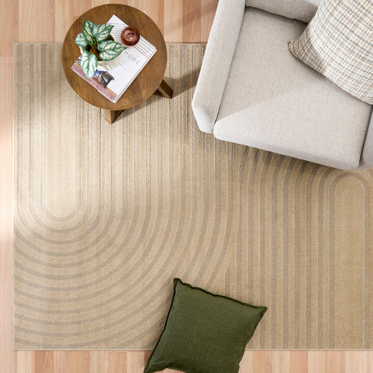 Beige striped area rug with concentric curve lines