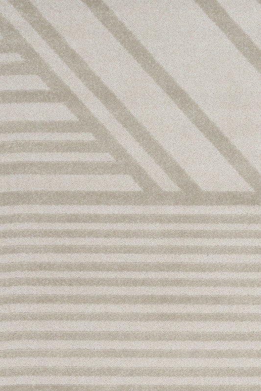 Area rug close-up with ash gray geometric stripes and chevrons pattern, flatweave