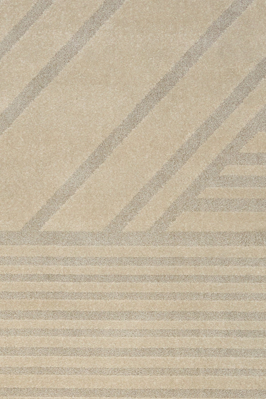 Beige area rug with geometric chevron pattern and flat woven texture