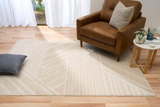 Ecru rectangular area rug with geometric stripe pattern and straight border
