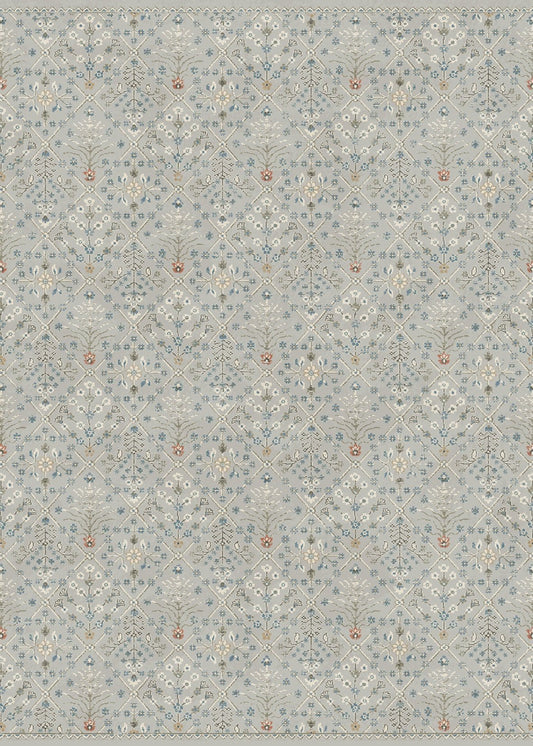 Traditional rug with peach and cream pattern on light background