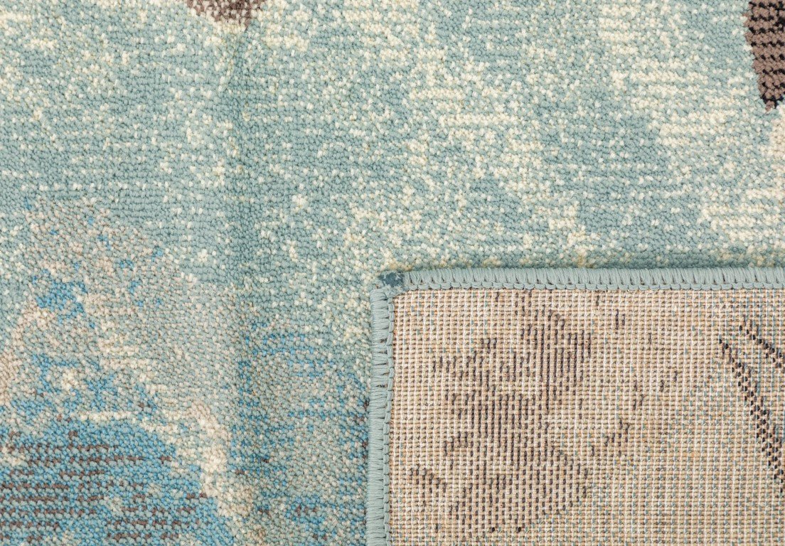 Sea blue rug detail with textured surface and beige border trim | Raffia Medium Rug 5507 Sea Textured Woven Floor Rug - Rugs Point Australia
