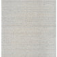 Light grey flatweave area rug with subtle speckling on a neutral ground