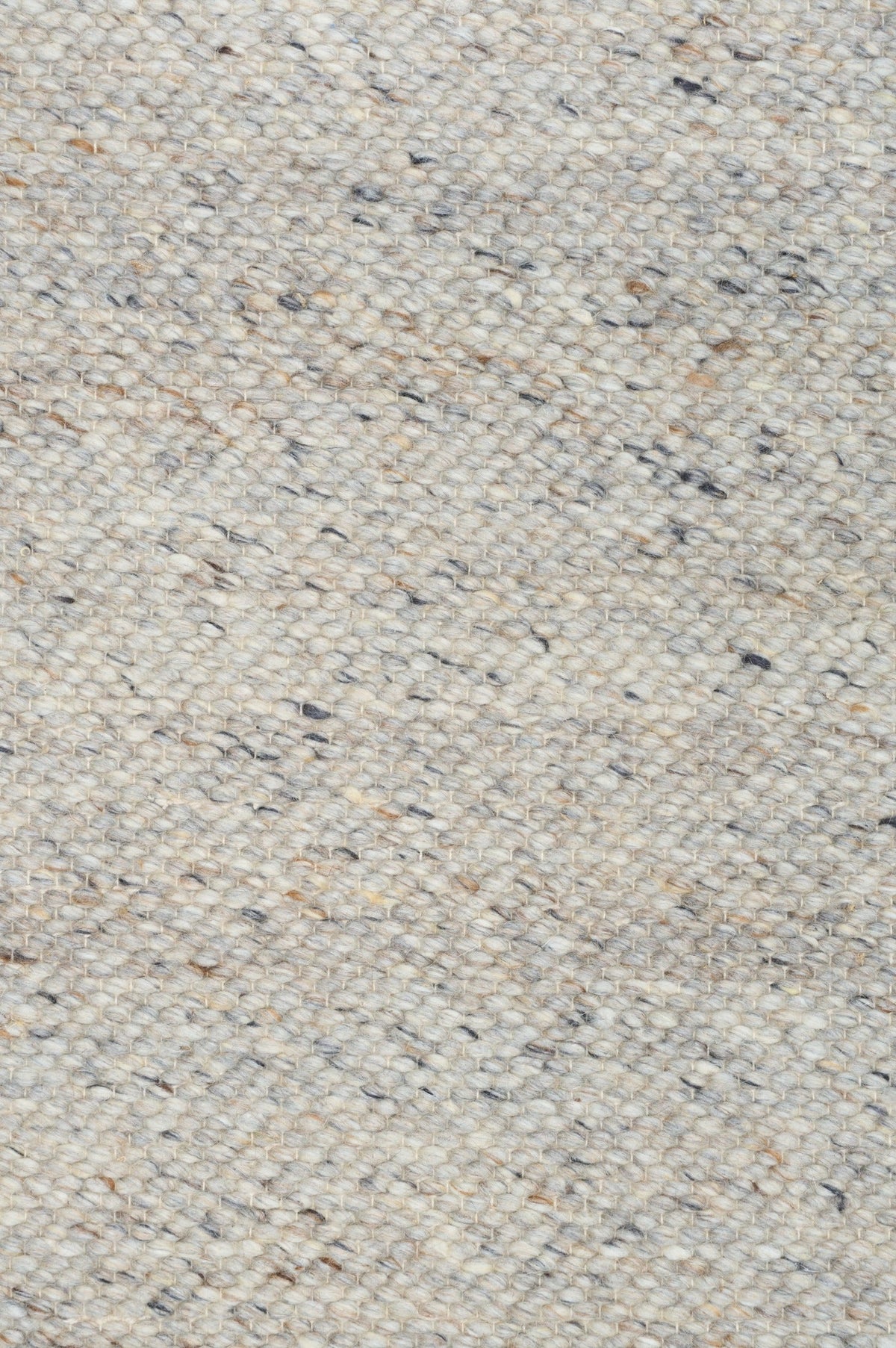 Light grey speckled area rug surface with fine flecked pattern