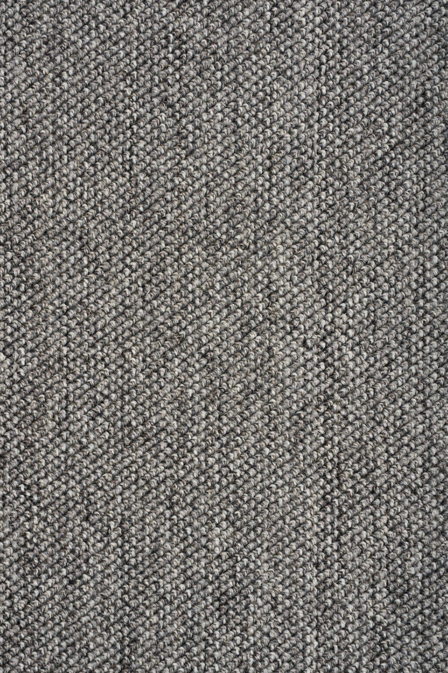 Grey woven area rug with tight textured pattern