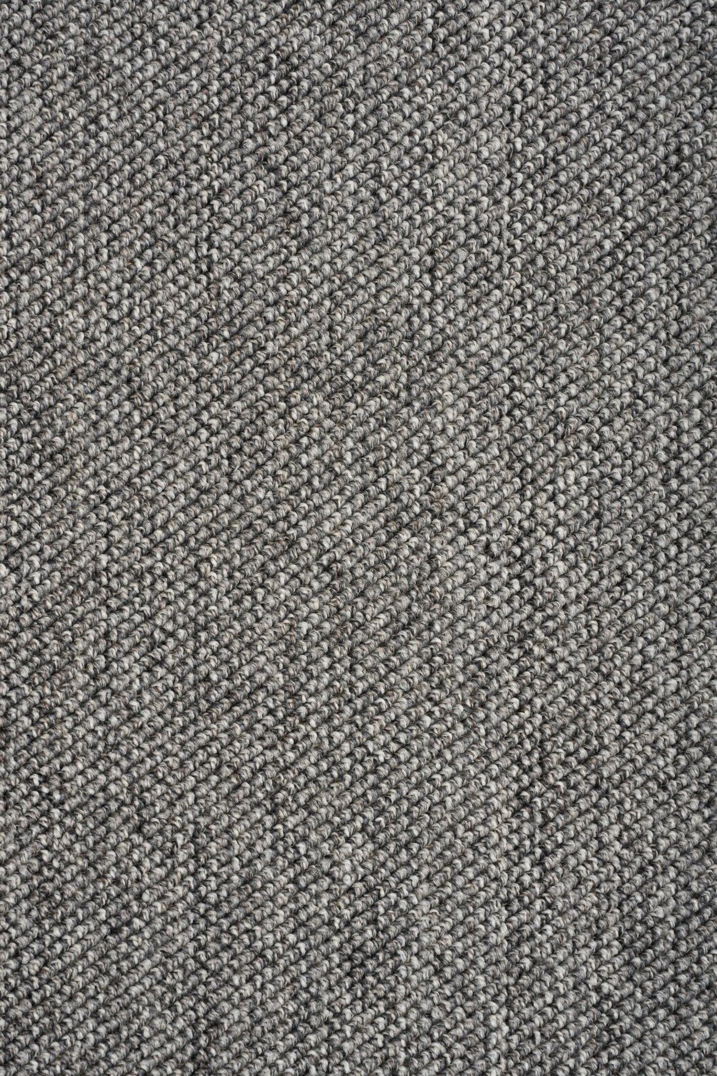 Grey woven area rug with tight textured pattern