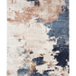 Flat view of rectangular abstract rug with cream, navy blue, and rust speckled finish