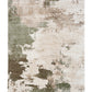 Green and cream abstract distressed area rug with mottled patchwork pattern