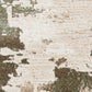 Close-up of green and cream abstract distressed area rug texture