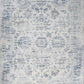 Ivory and blue abstract distressed rug with faded pattern