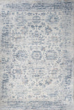 Ivory and blue abstract distressed rug with faded pattern