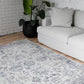 Ivory and blue modern rug with distressed abstract print