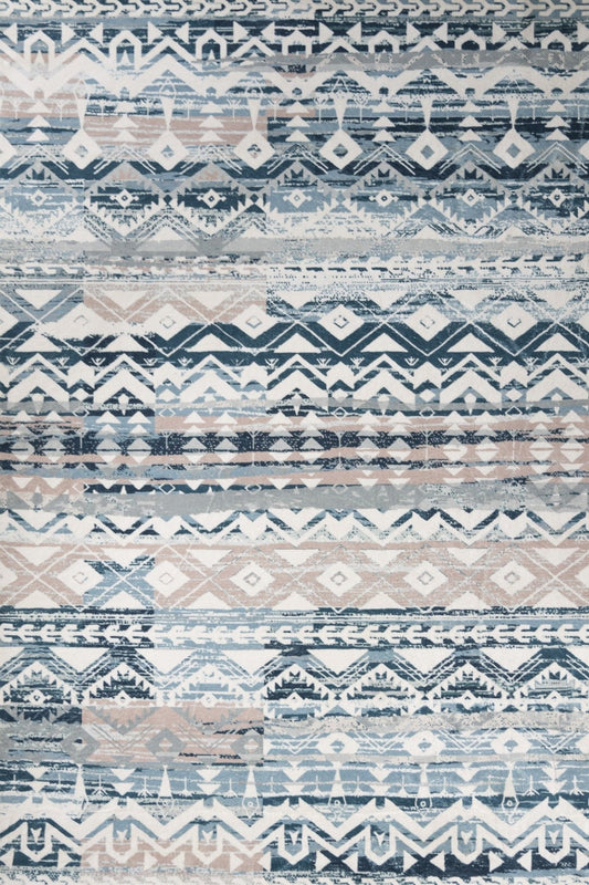 Modern medium printed rug with navy, white, and tan geometric pattern