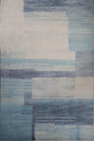 Zoe printed modern medium rug with abstract blue and gray geometric blocks