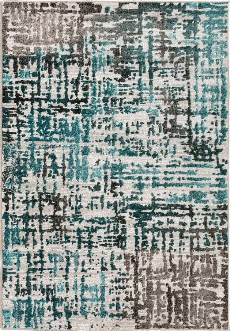 Abstract area rug with teal, dark gray, and light gray pixel-like pattern