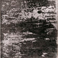 Gray and white abstract rug with speckled distressed blocks, rectangular design