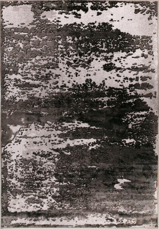 Gray and white abstract rug with speckled distressed blocks, rectangular design