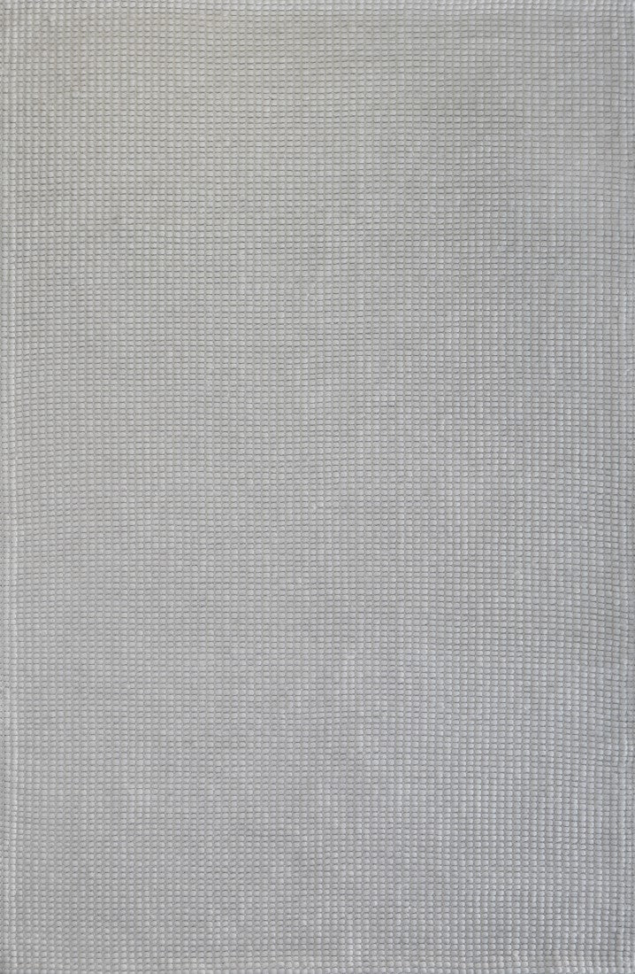 Cream wool rug with tight woven texture